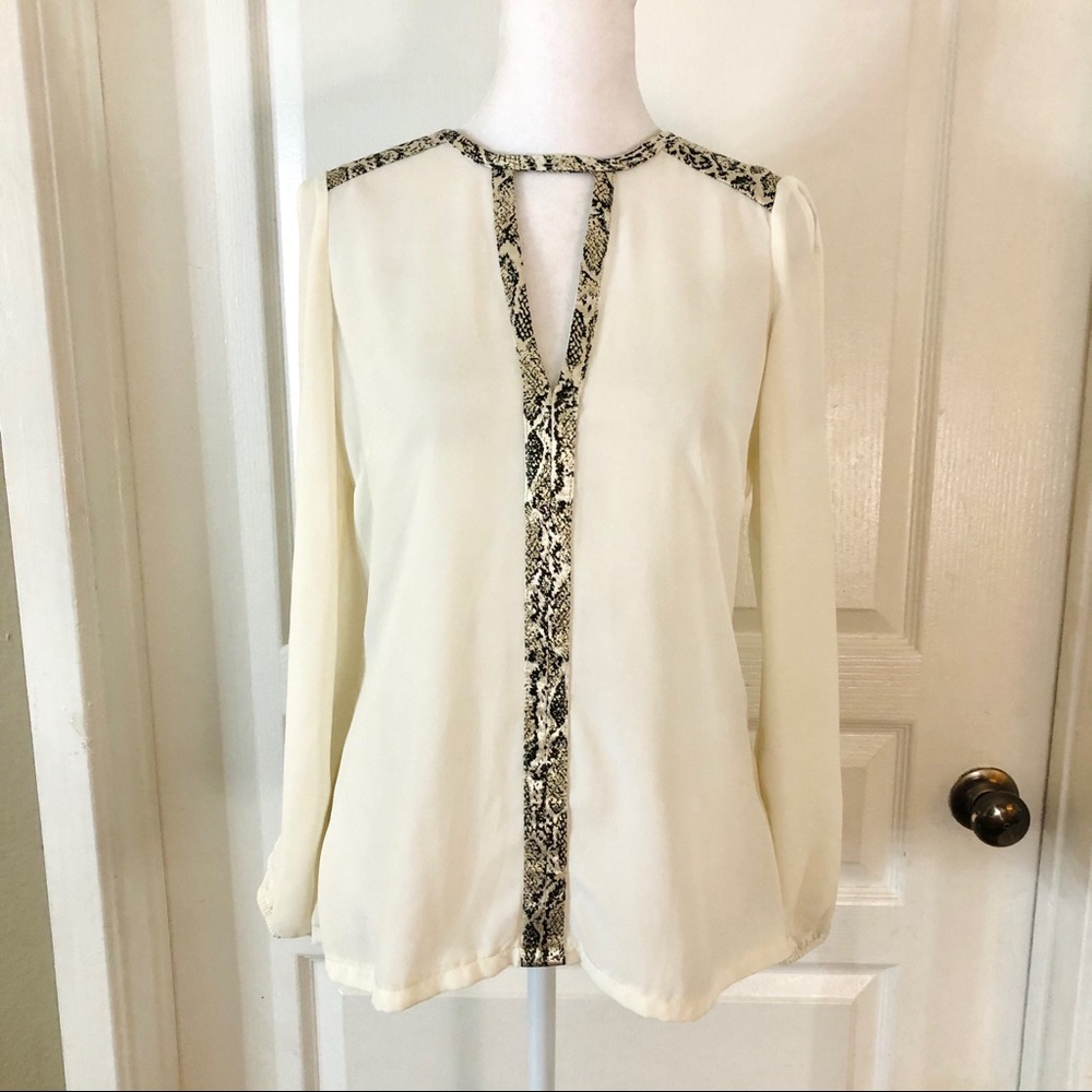 Glow cream blouse with snakeskin print trim